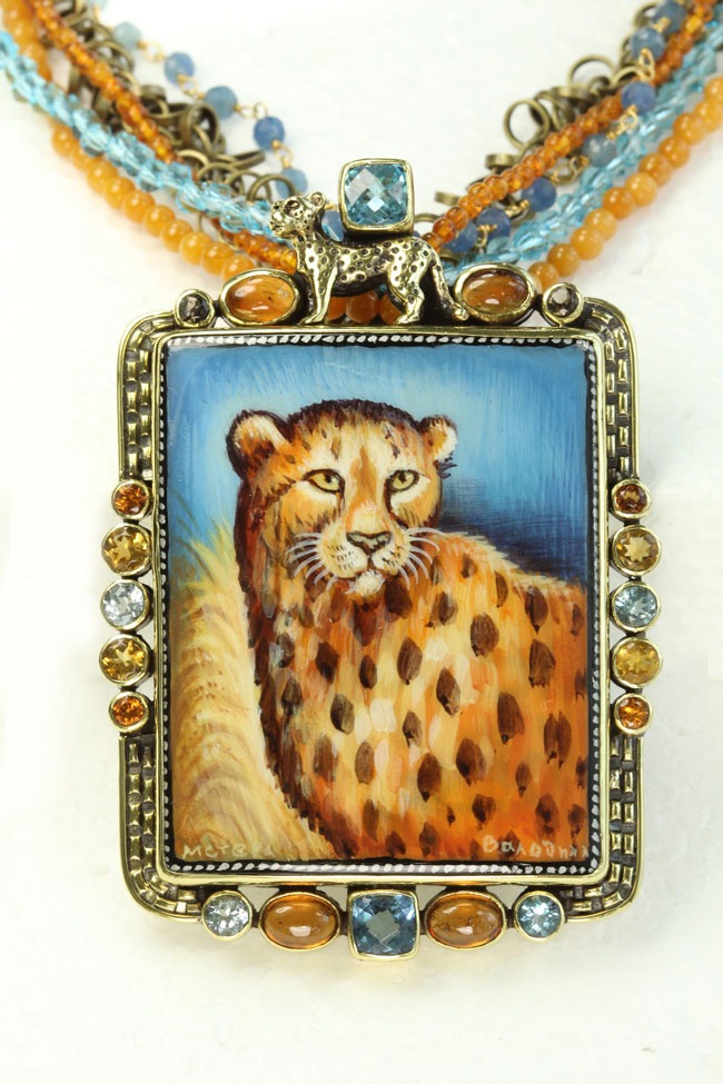CHEETAH IN THE GRASS