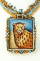 CHEETAH IN THE GRASS