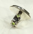Echo of the Dreamer Rhyolite Ring with Peridot 