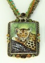 Leopard on Tree Branch
