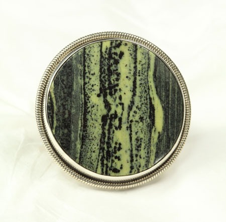 Echo of the Dreamer Rhyolite Ring with Peridot 