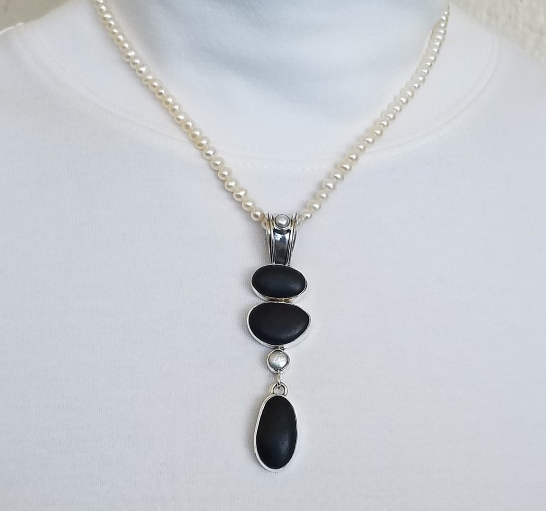 Echo of the Dreamer Black River Rock Pendant Necklace