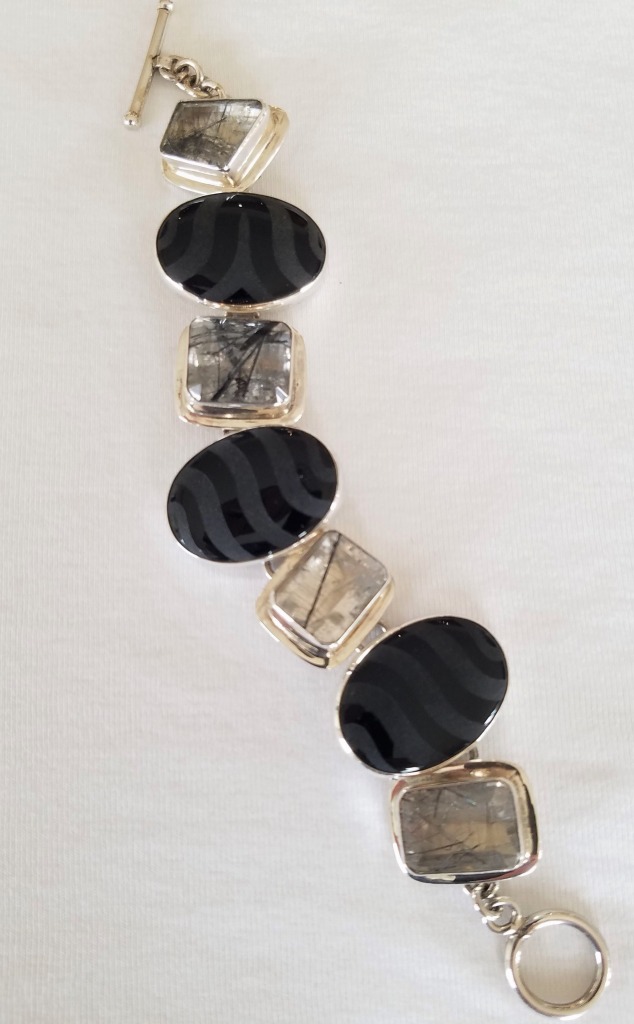 Echo of the Dreamer Large Carved Onyx Clip Earrings
