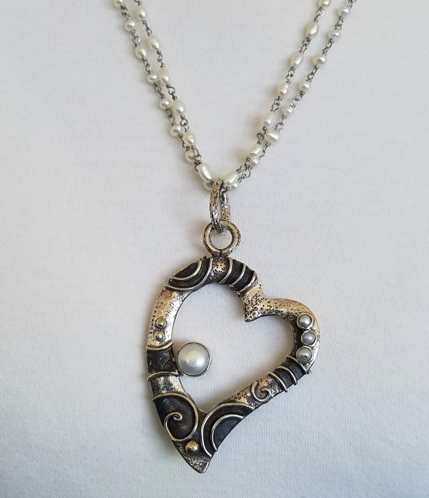 Echo of the Dreamer Sterling Silver Open Heart Pendant Necklace